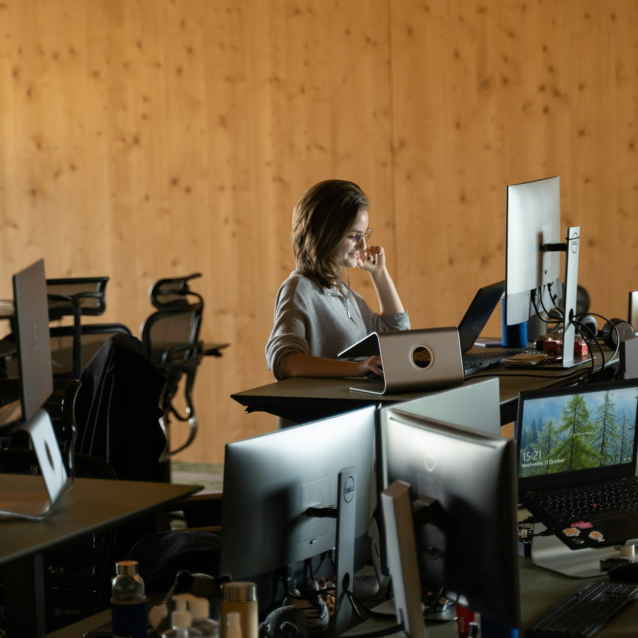 Operations team at work behind monitors